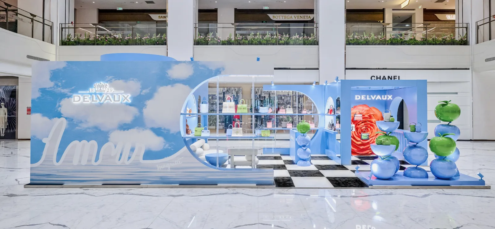 Blue Delvaux pop-up environment with sculptural product displays in Beijing.