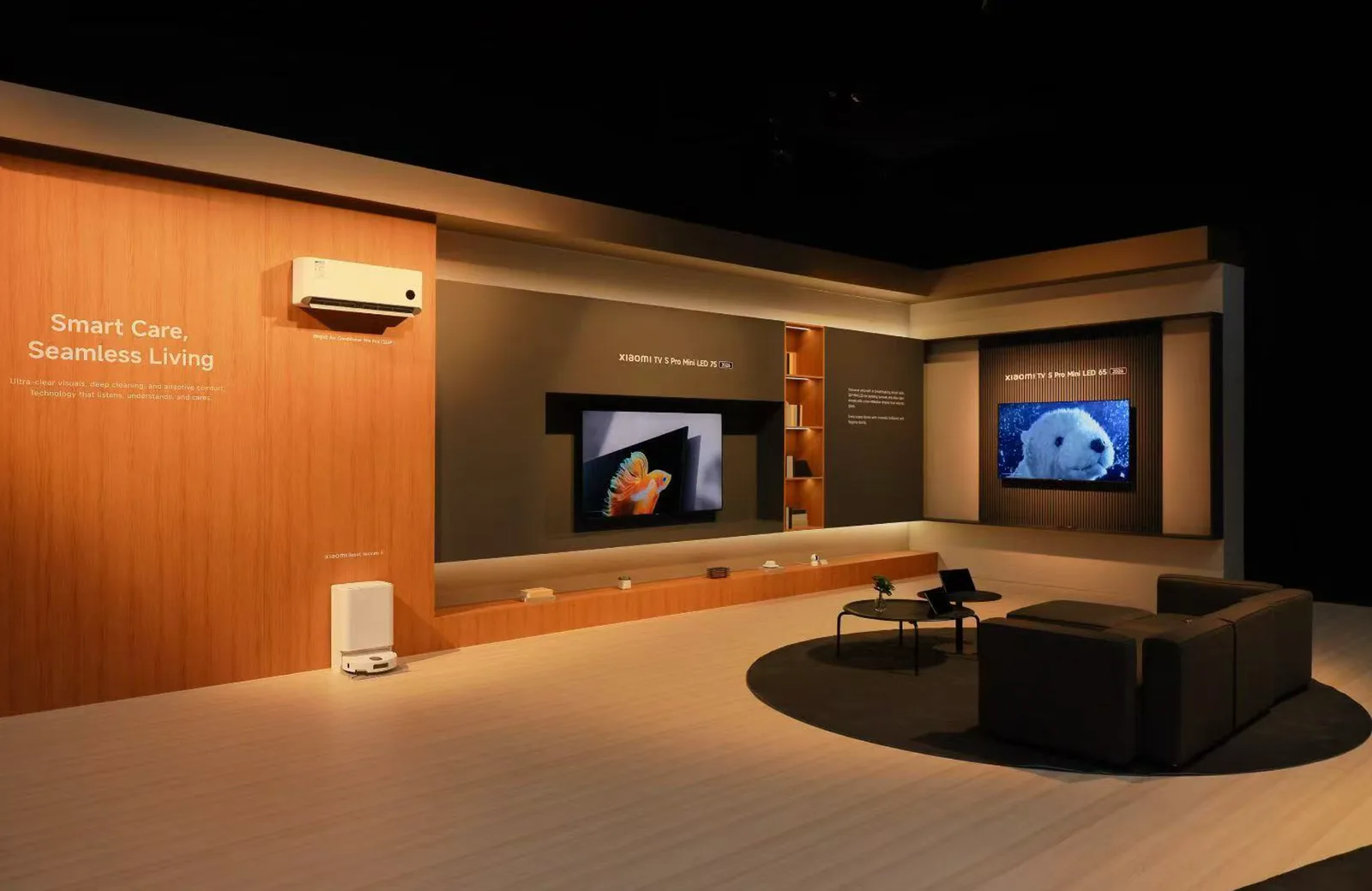 Xiaomi smart-home living-room set with a wall-mounted television and connected appliances.