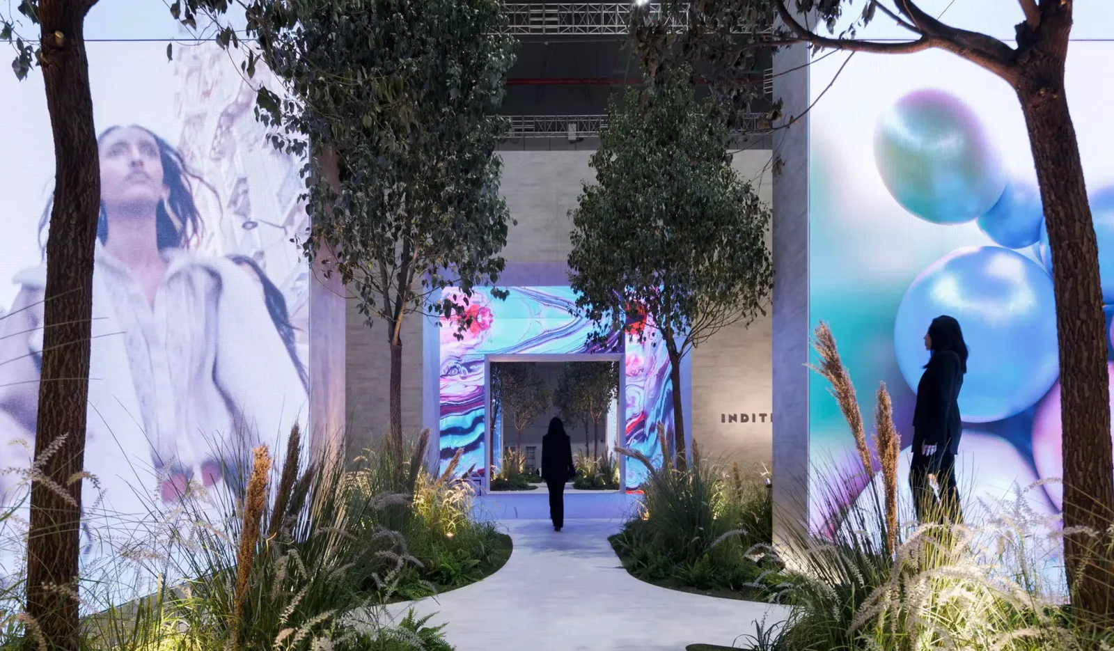 Central walkway between two full-height LED walls at a ZARA activation in Shanghai.